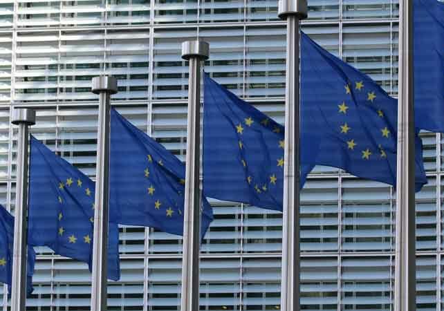 Five European Union flags in a row symbolizing European passport available after obtaining Portuguese citizenship | GetNif