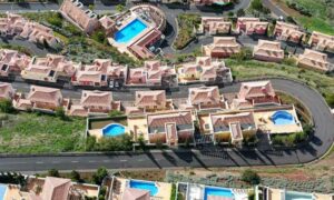 Overhead shot of multiple homes in Portugal used to illustrate passage about rental income in Portugal | GetNif